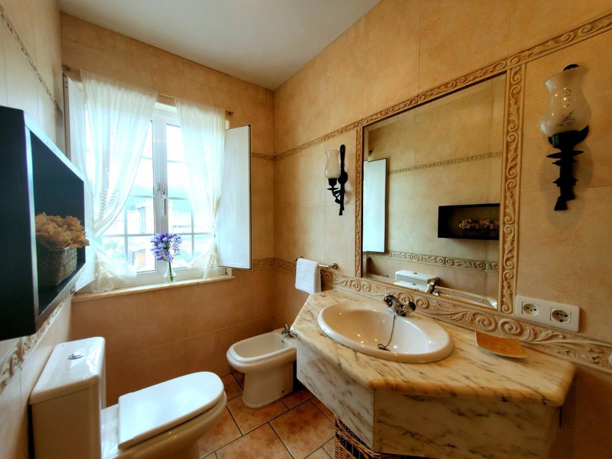 Apartamentos Turisticos Rosa 里瓦德奥 外观 照片